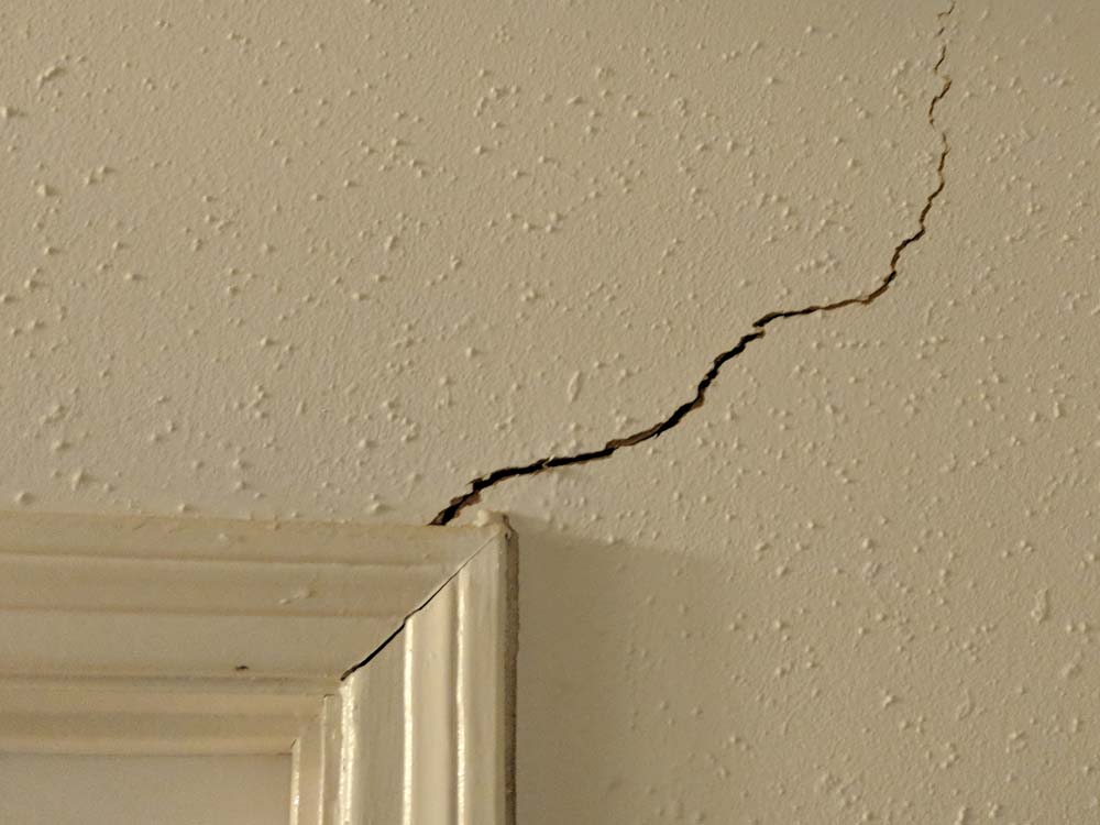 Interior Warning Sign: Cracking Sheetrock